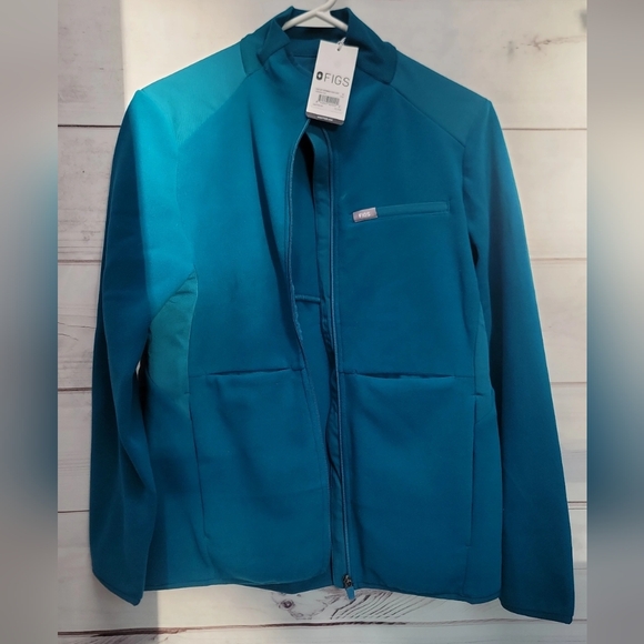 NWT FIGS Teal Blue On Performance Fleece Scrub Jacket Size Medium - Picture 1 of 3